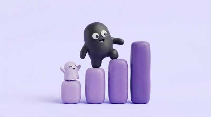 La mascotte Velo grimpe un histogramme croissant pendant qu'un fantôme joyeux l'encourage